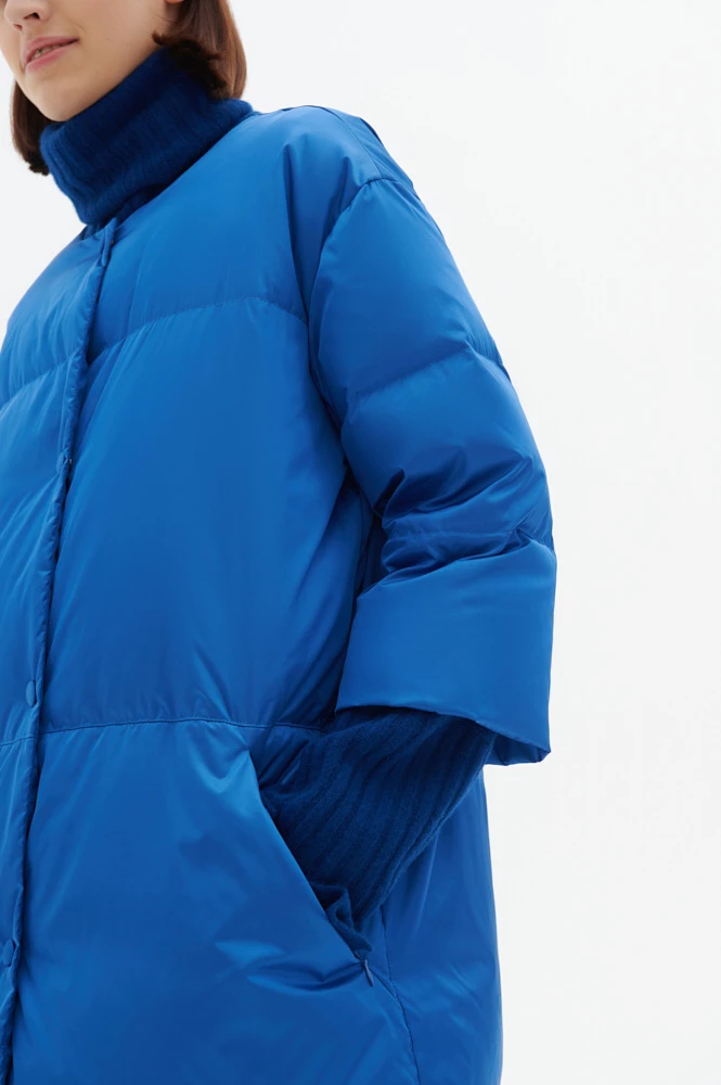 Пуховик с укороченным рукавом и трикотажными деталями