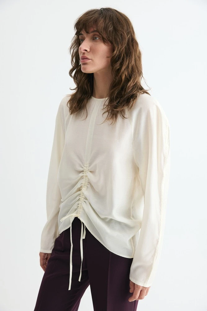 Блуза полупрозрачная О-силуэта