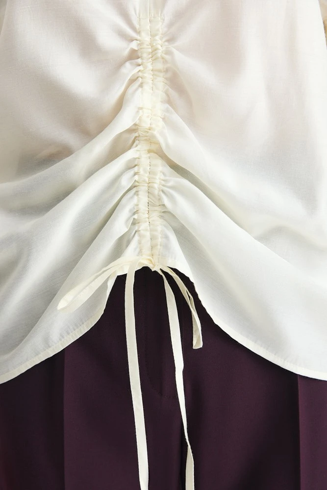 Блуза полупрозрачная О-силуэта