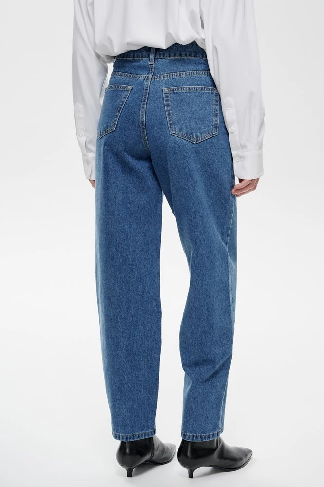 Джинсы Tapered