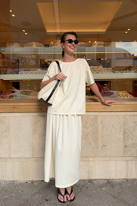 Юбка миди из трикотажа (Трикотаж тонкий арт.2016 Молочный 36% тенсел, 49% нейлон, 6% эластан; Размер: L)